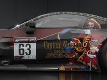 Red and Black Aston Martin with Captain Morgans logo on the side