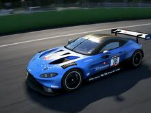 Blue Aston Martin going through Monza's main straight.