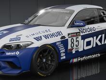 BMW M2 CS Racing liveried in the style of a Finland National Football Team away kit, featuring title sponsorship from Nokia