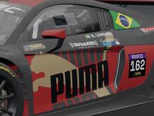 A close up of the car's side showing sponsor branding and customization for the driver.