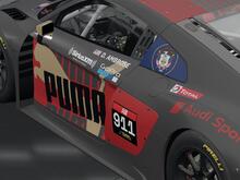 A rear side view of the car showing sponsors and driver customization.