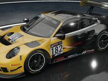 Porsche 911-2. Livery is a yellow to black gradient. The front of the porsche is yellow and transitions to black halfway down the car.