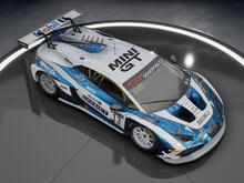 A Lamborghini Huracan GT3 Evo 2, painted white with marbled blue and gold decals.