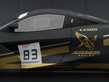 Side view of Daniele Di Marzo’s black and gold Auronero Racing McLaren 720S GT3 Evo, number 83, in Assetto Corsa Competizione.