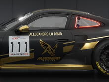 Side view of Alessandro Lo Pomo’s black and gold Auronero Racing Porsche 992 GT3 R, number 111, in Assetto Corsa Competizione.