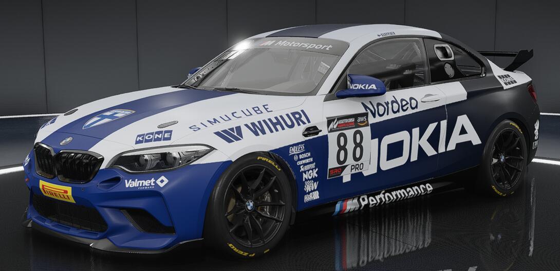 BMW M2 CS Racing liveried in the style of a Finland National Football Team away kit, featuring title sponsorship from Nokia