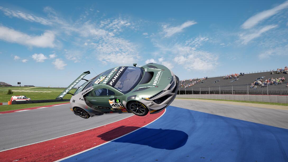 Green Honda NSX flies through the air